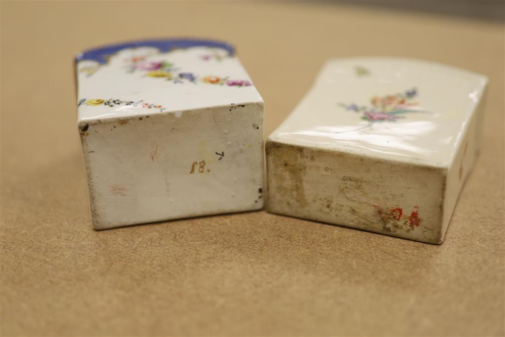 A late 18th/early 19th century Meissen tea canister painted with flowers under a blue scale border faint blue crossed swords in blue